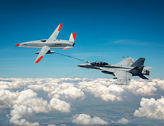 MQ-25 refueling an F/A-18 Super Hornet.