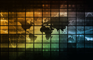 Picture of a multi colored world map graphic with grid lines.