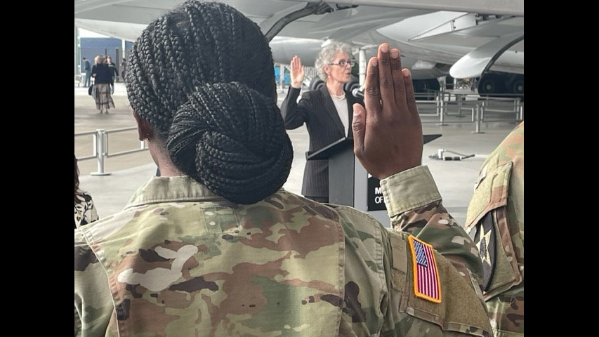 Shenika Vassell takes the U.S. Oath of Allegiance at the Museum of Flight, Sept. 12, 2023