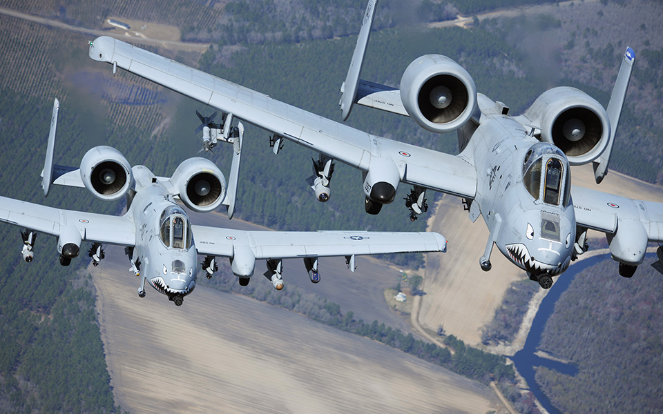 Two A-10 Thunderbolt IIs in flight