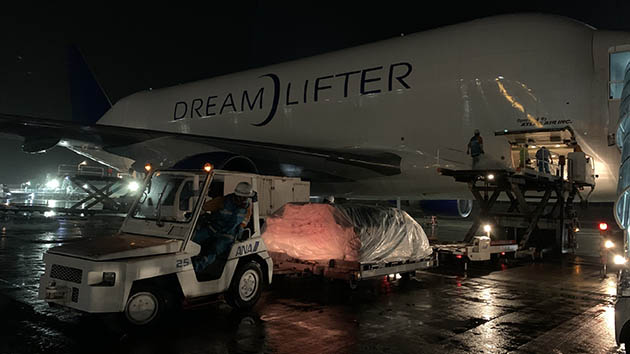 Airport ground crews in Nagoya, Japan, work through the night to load 500,000 protective face masks bound for Utah students and teachers. (Atlas Air photo)