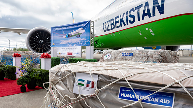 Pallets filled with hospital beds, mattresses and wheelchairs wait to be loaded into Uzbekistan Airways’ newest airplane before it departs Paine Field in Everett, Wash. 